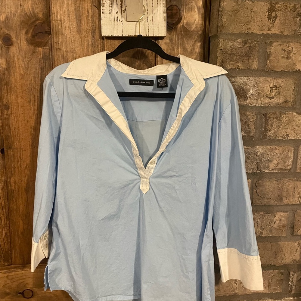 Women’s light blue and white blouse